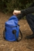 Stansport 12 Liter Outdoor Trail Bucket with Lid unzipped and opened by person