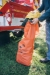 True North Gear Decon Bag 75L - Wildland firefighter putting gear into bag